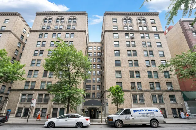 a view of a street with sitting area