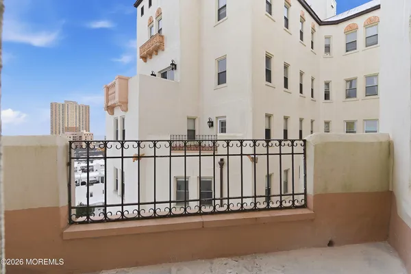 a view of a building from a balcony