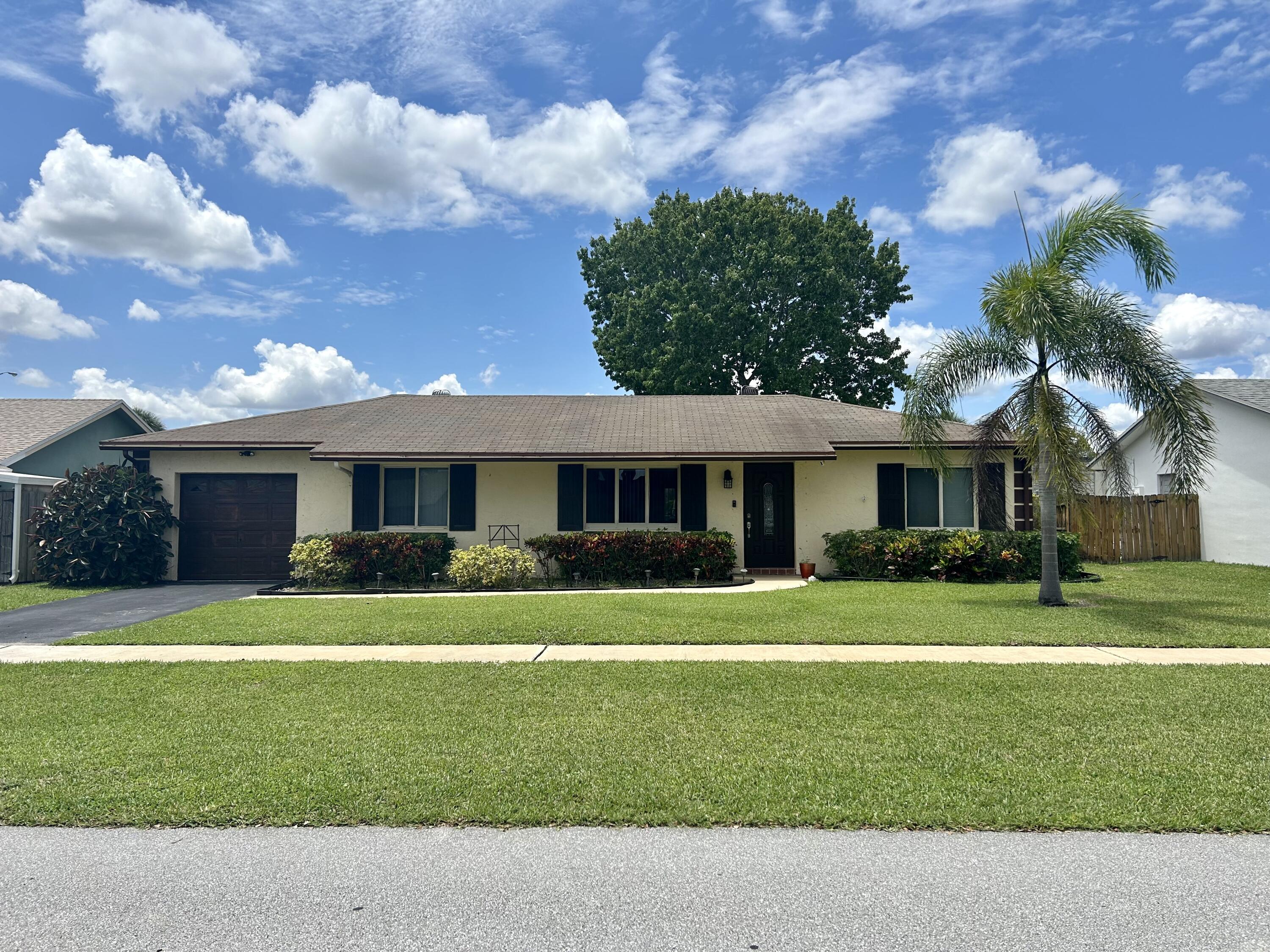 19487 Delaware Circle Boca Raton, FL 33434 - Photo 1 of 23 FRONT