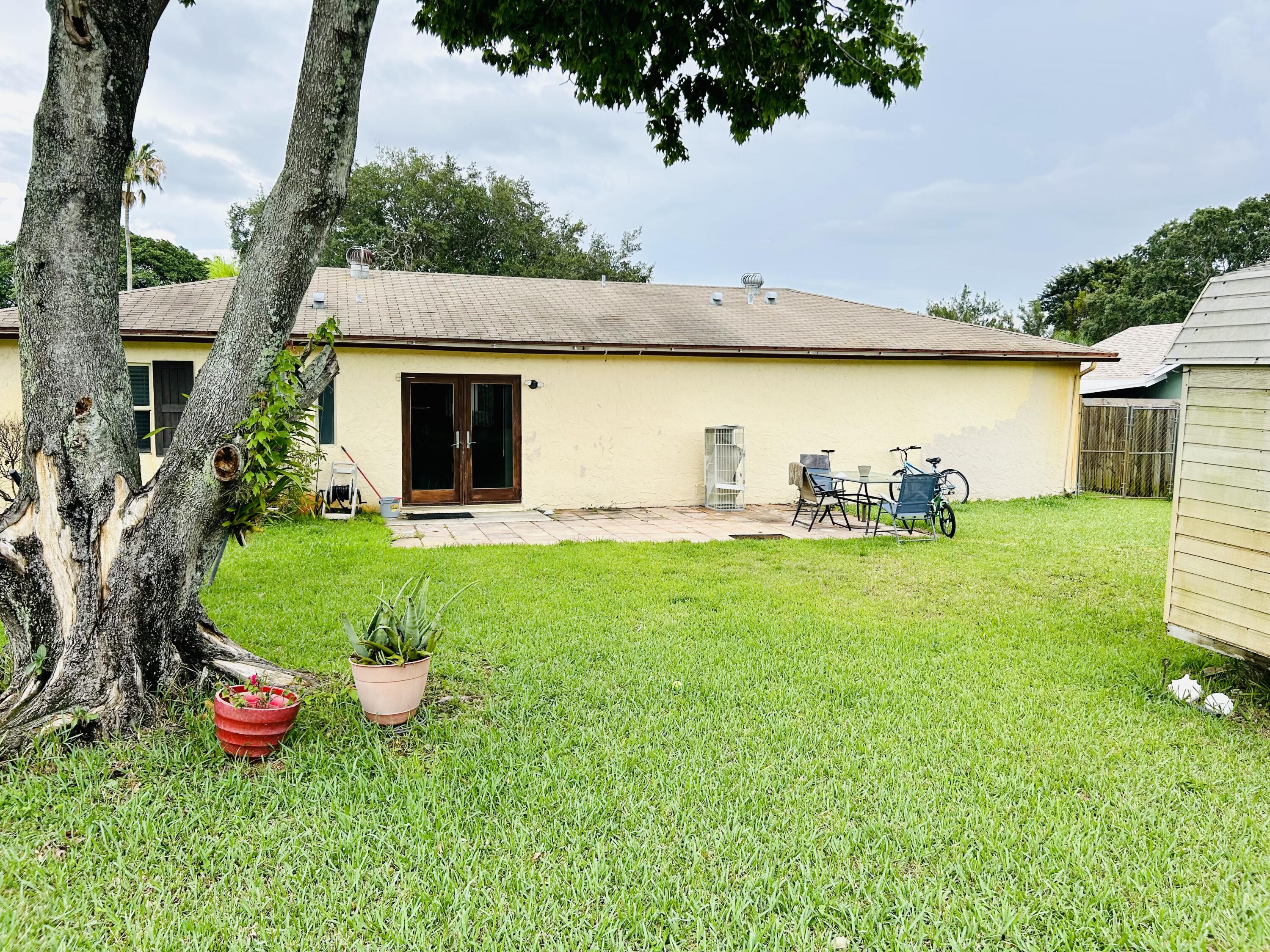 19487 Delaware Circle Boca Raton, FL 33434 - Photo 17 of 23 BACK OF THE HOUSE
