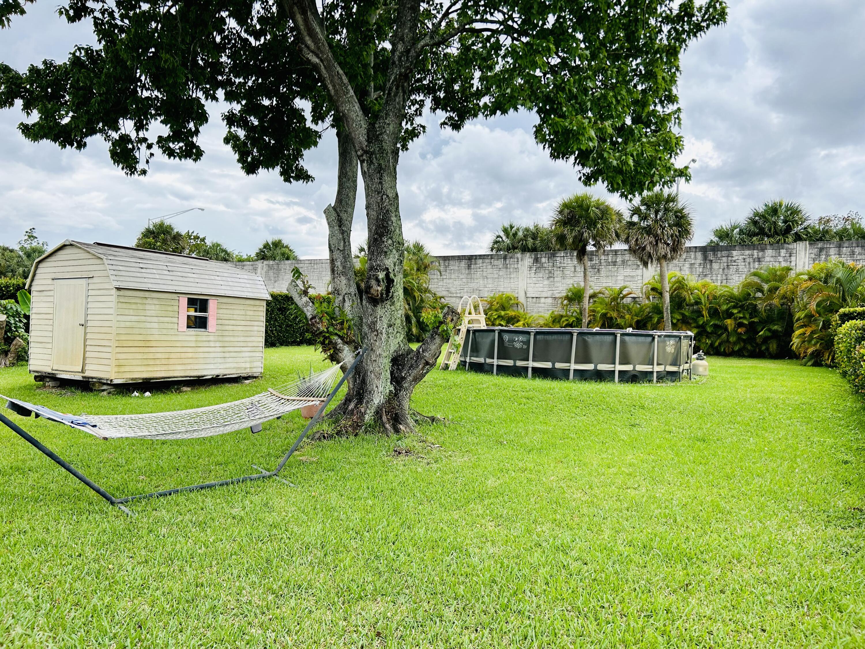 19487 Delaware Circle Boca Raton, FL 33434 - Photo 18 of 23 SHED/POOL