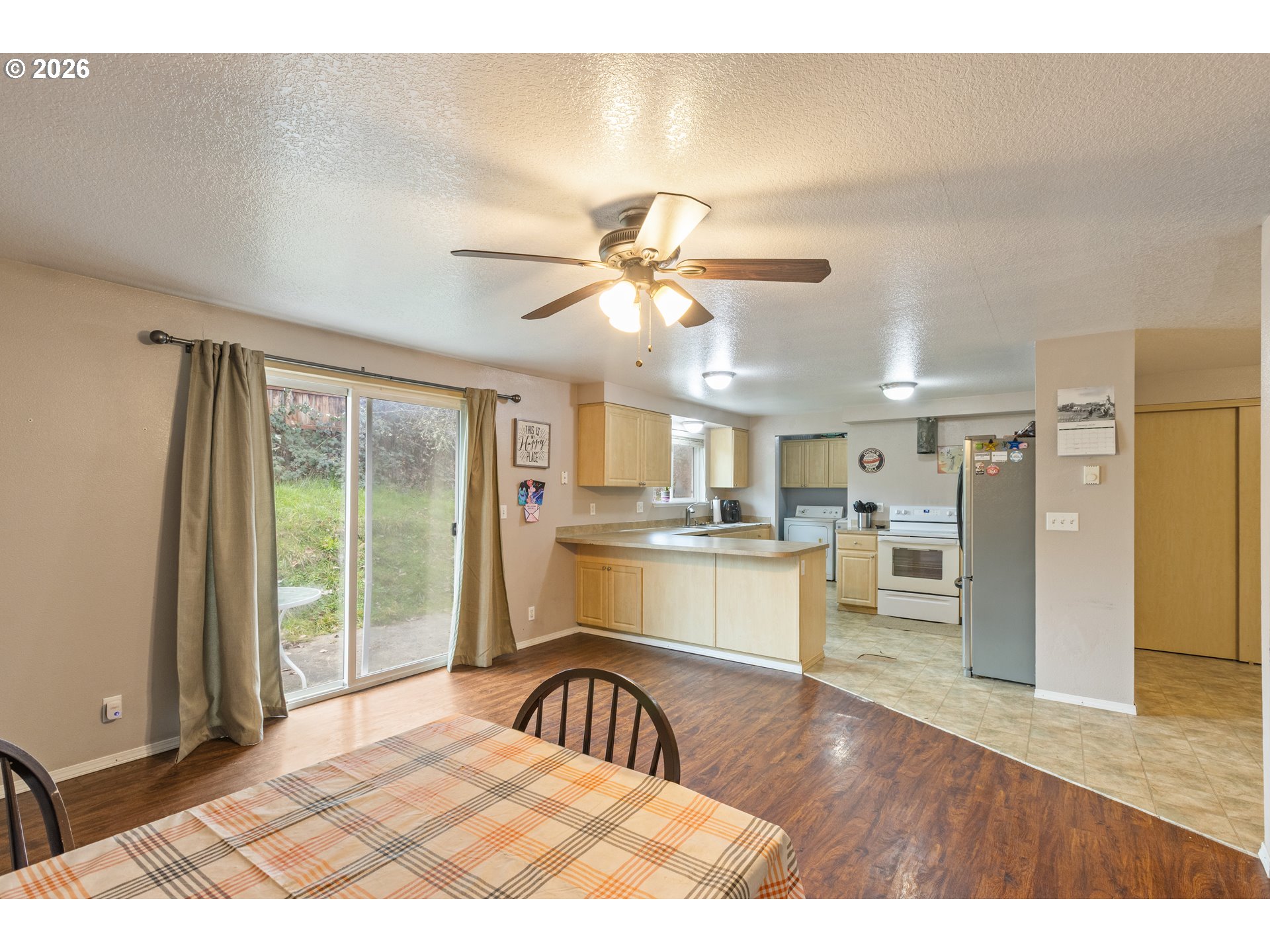 220 Southeast Wells Road Oakland, OR 97462 - Photo 14 of 45 a kitchen with a refrigerator and a sink