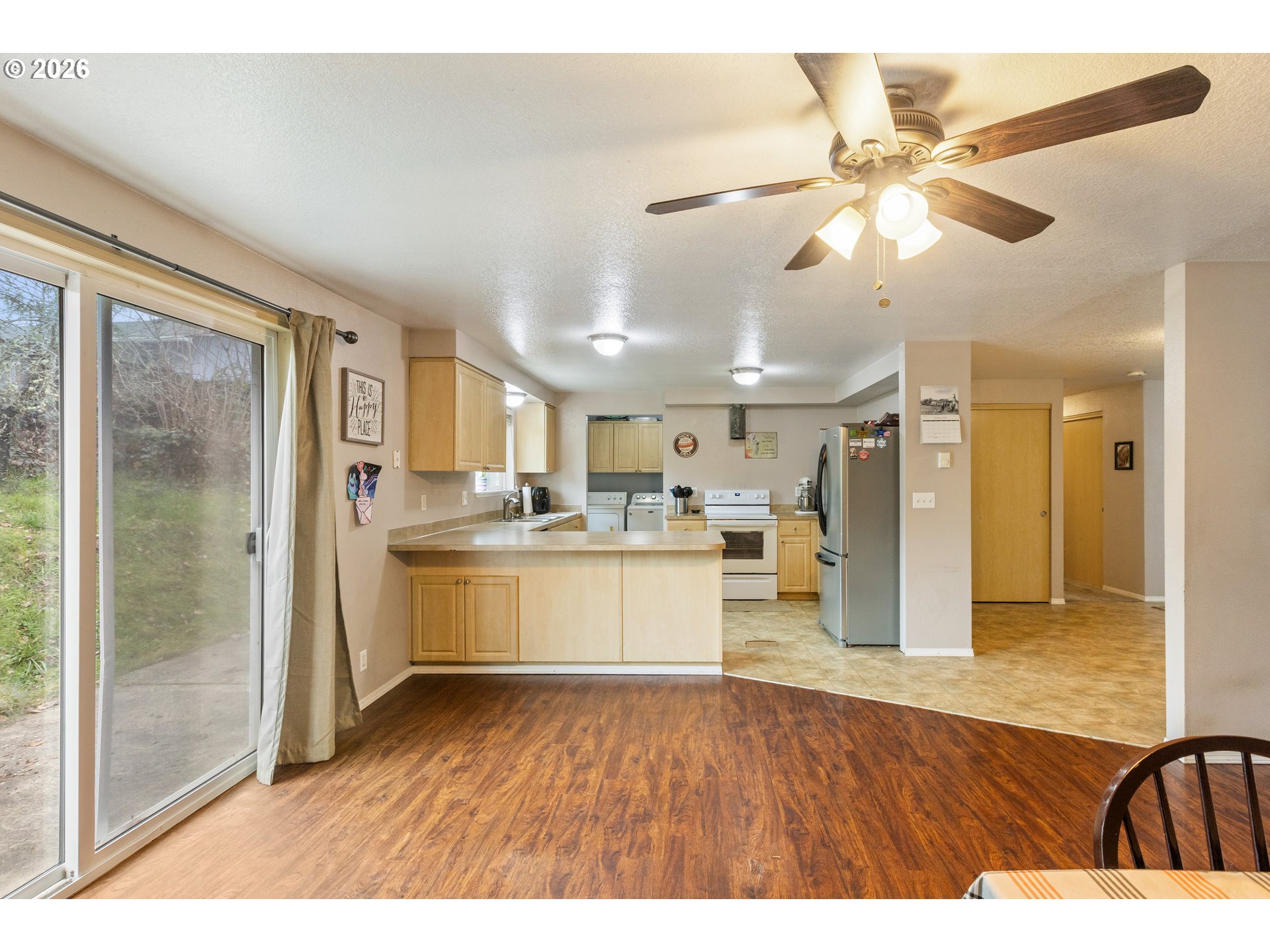 220 Southeast Wells Road Oakland, OR 97462 - Photo 15 of 45 a view interior of kitchen and hall with wooden floor