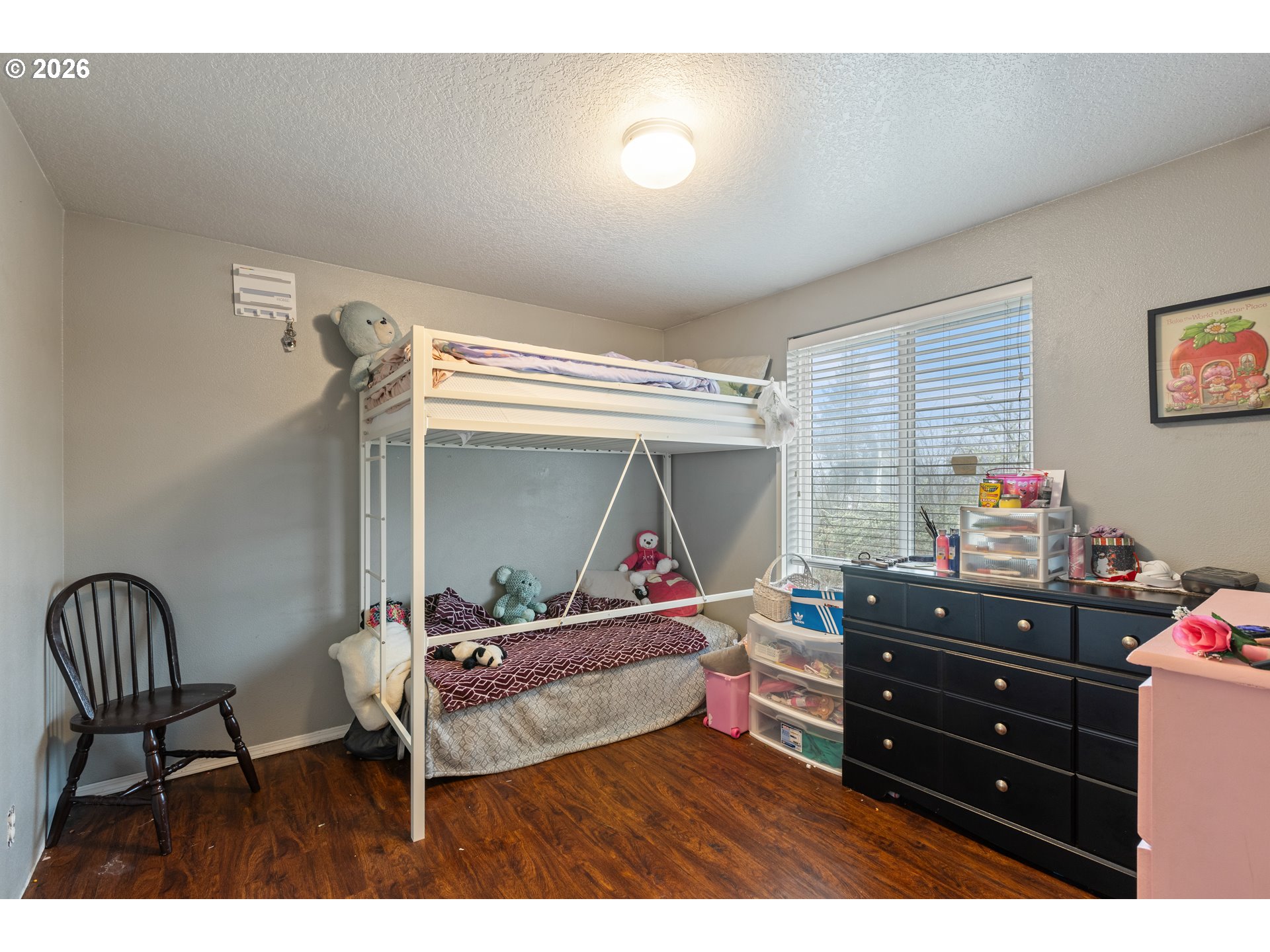 220 Southeast Wells Road Oakland, OR 97462 - Photo 37 of 45 a bedroom with a bed and a dresser