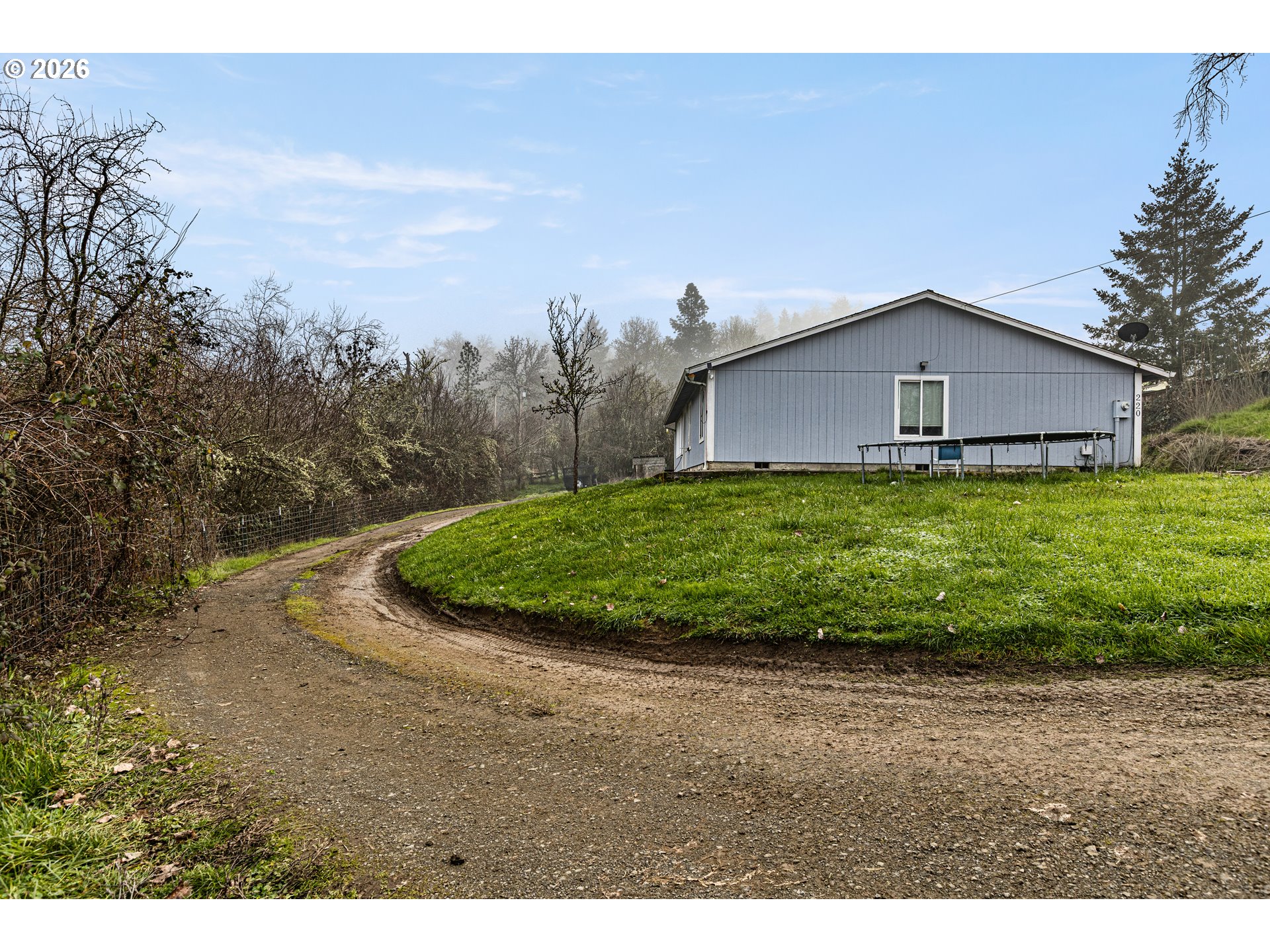 220 Southeast Wells Road Oakland, OR 97462 - Photo 44 of 45 a view of a house with a yard