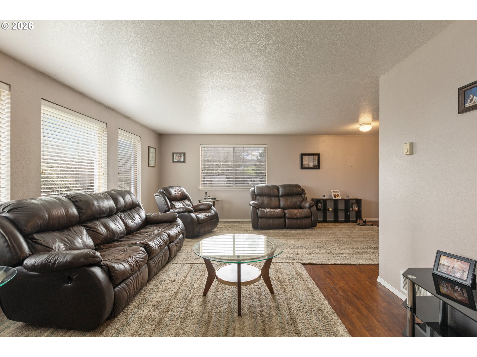220 Southeast Wells Road Oakland, OR 97462 - Photo 7 of 45 a living room with furniture a wooden floor and a window
