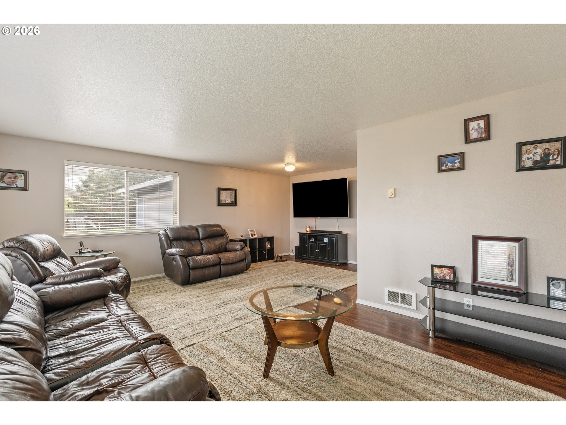 220 Southeast Wells Road Oakland, OR 97462 - Photo 8 of 45 a living room with furniture and a flat screen tv