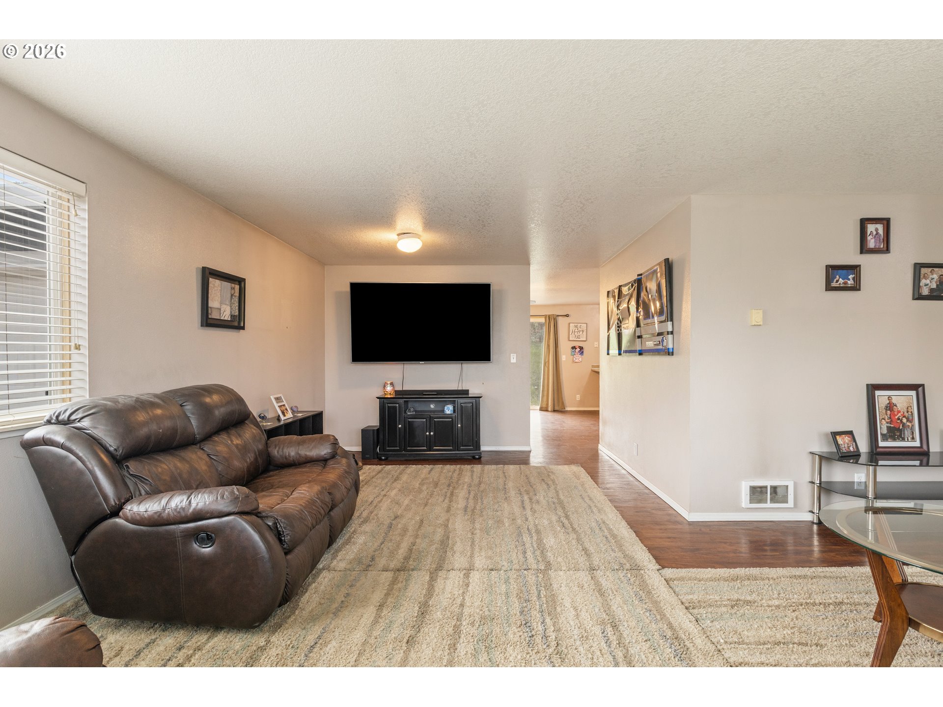 220 Southeast Wells Road Oakland, OR 97462 - Photo 9 of 45 a living room with furniture and a flat screen tv