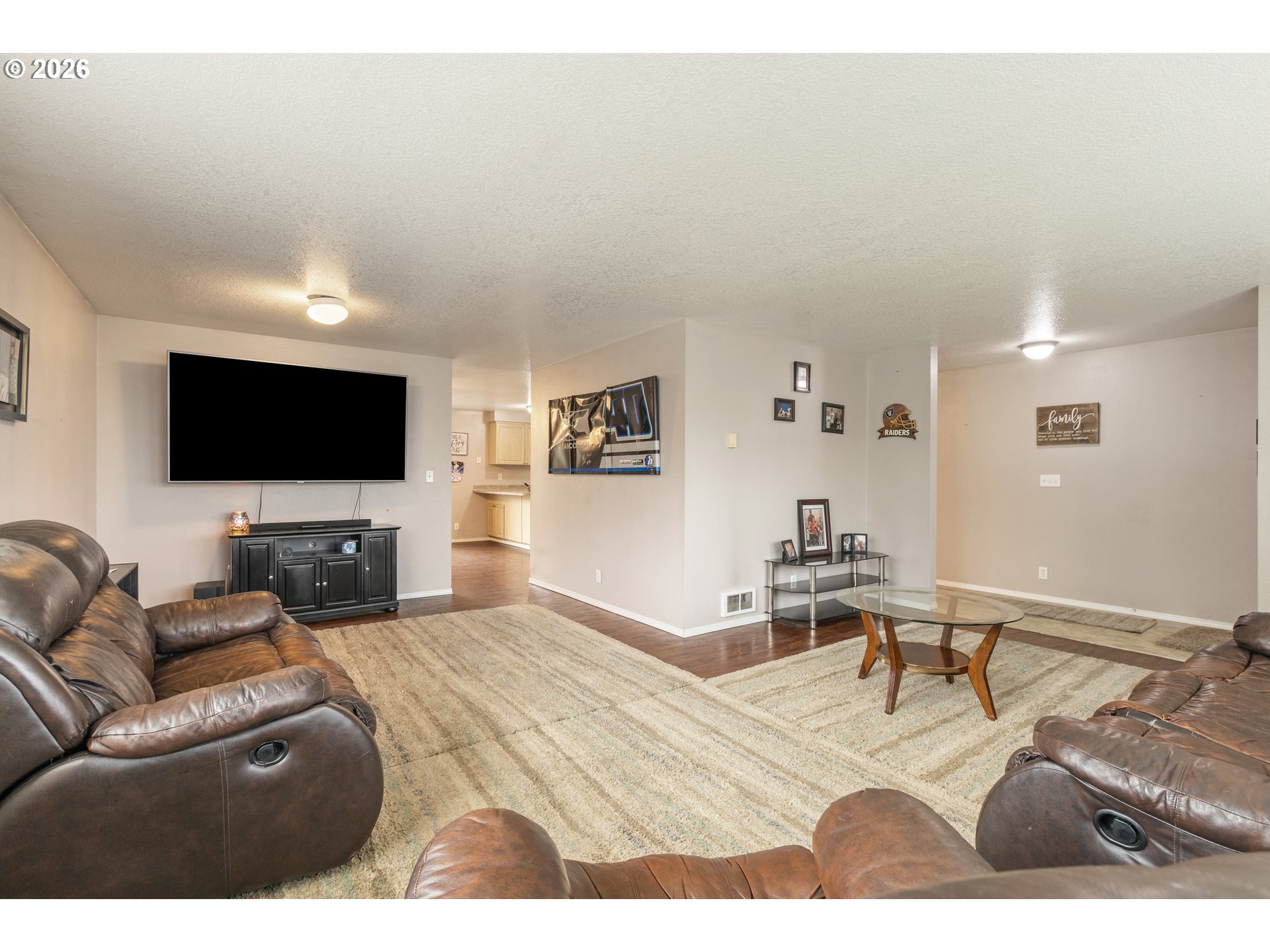 220 Southeast Wells Road Oakland, OR 97462 - Photo 10 of 45 a living room with furniture and a flat screen tv