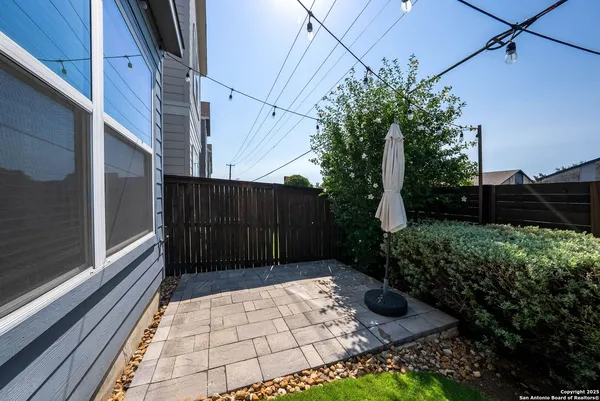 a view of backyard with cabin