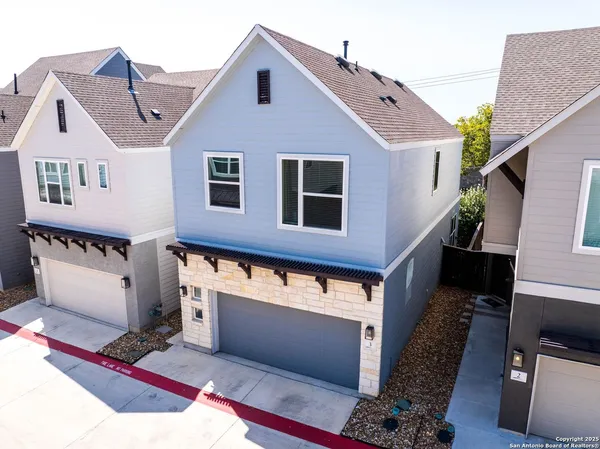 a front view of a house with a garage