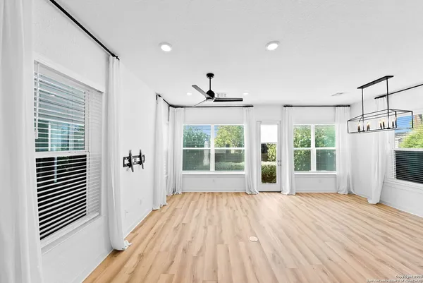 a view of a room with a large window