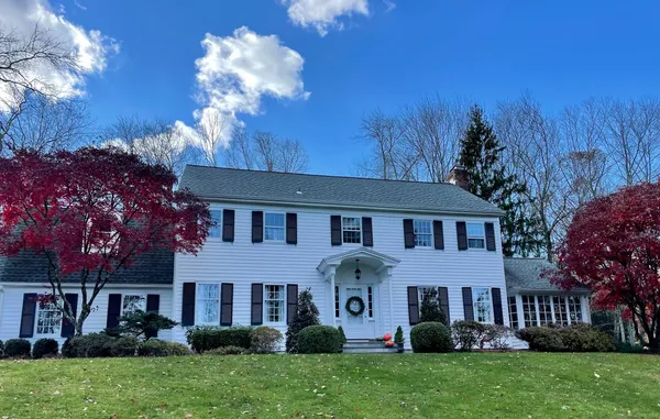 front view of a house with a yard