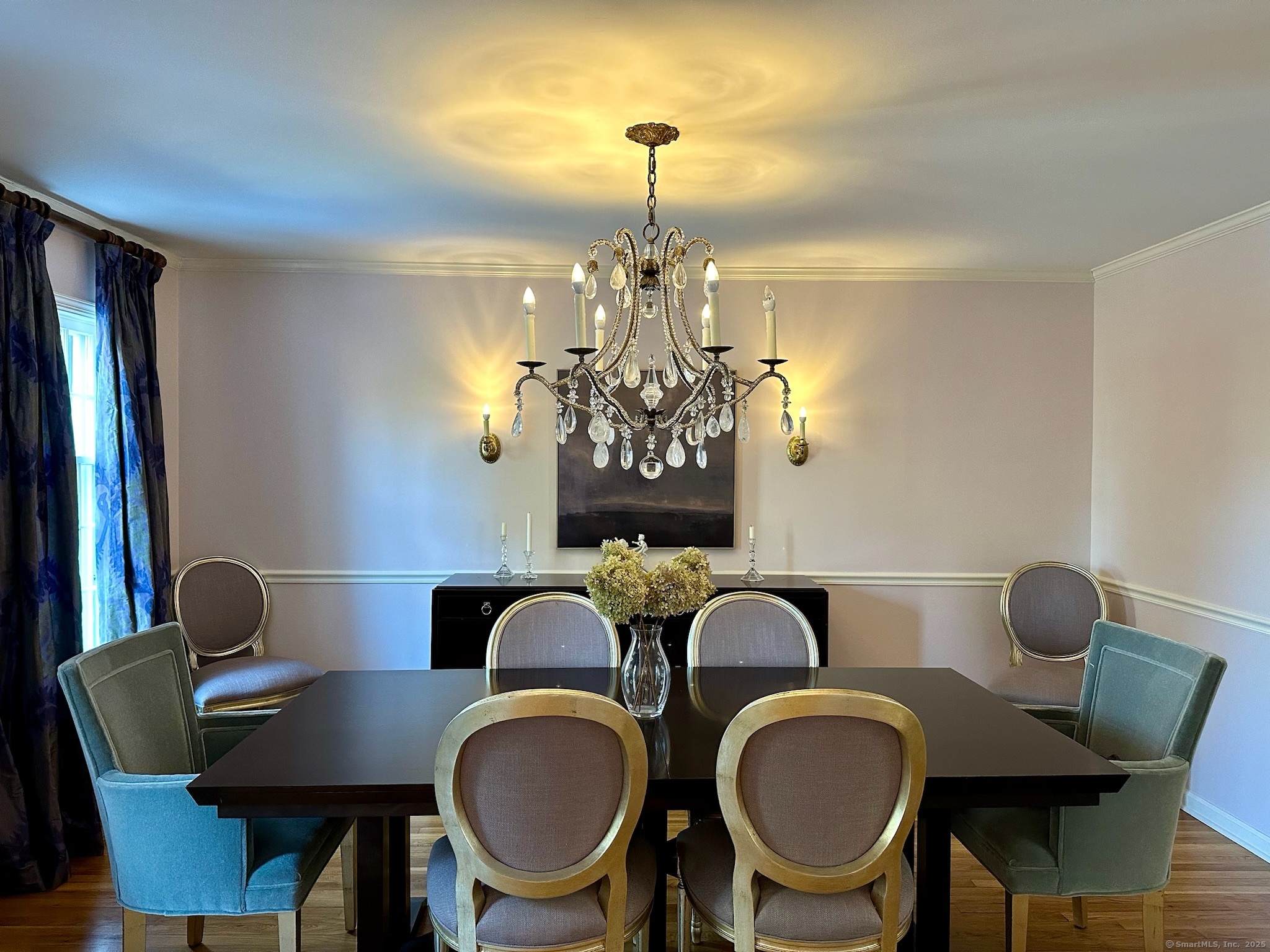 25 Deacons Lane Wilton, CT 06897 - Photo 17 of 37 a view of a dining room with furniture and chandelier