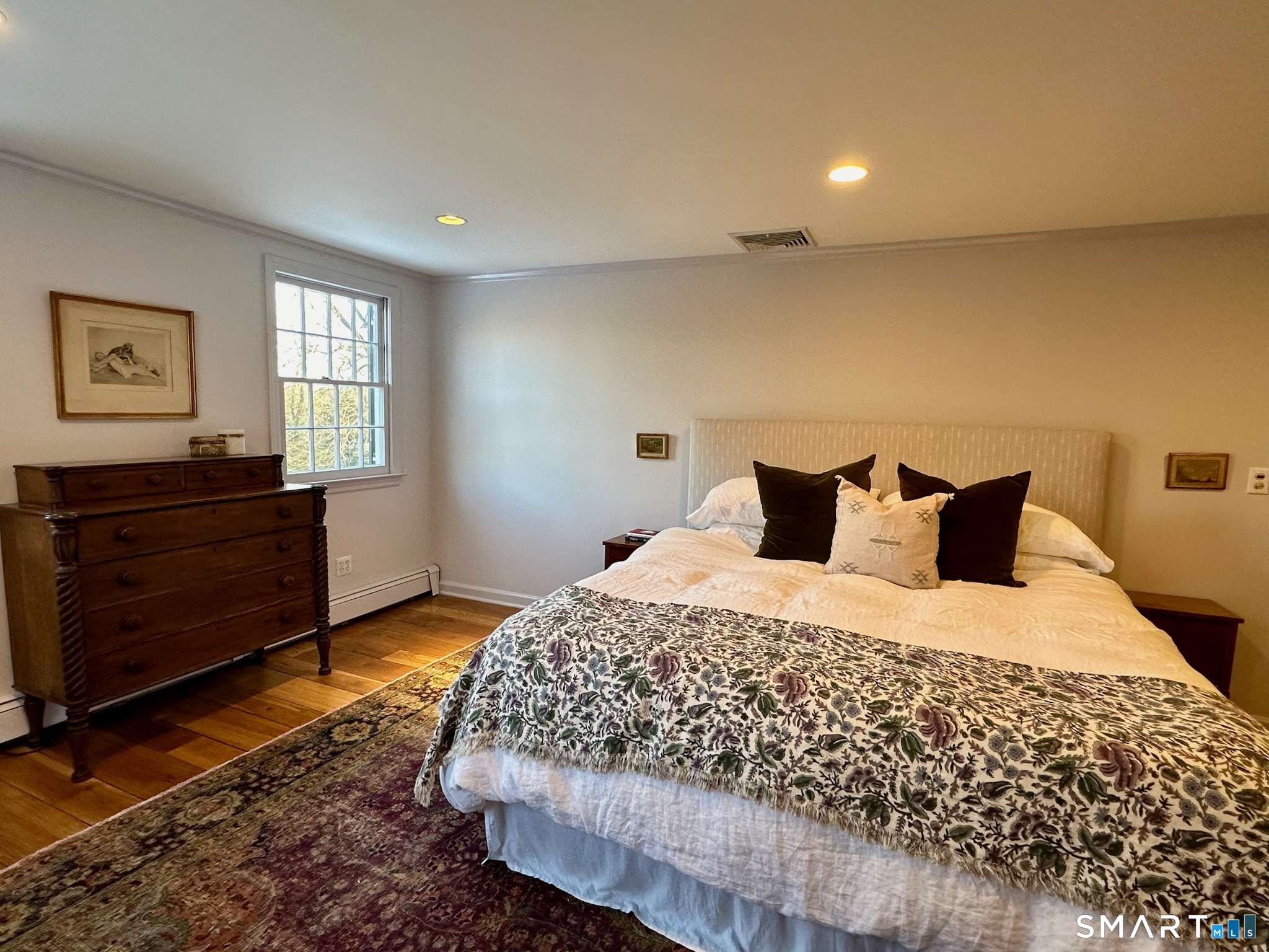 25 Deacons Lane Wilton, CT 06897 - Photo 20 of 37 a bedroom with a bed and window