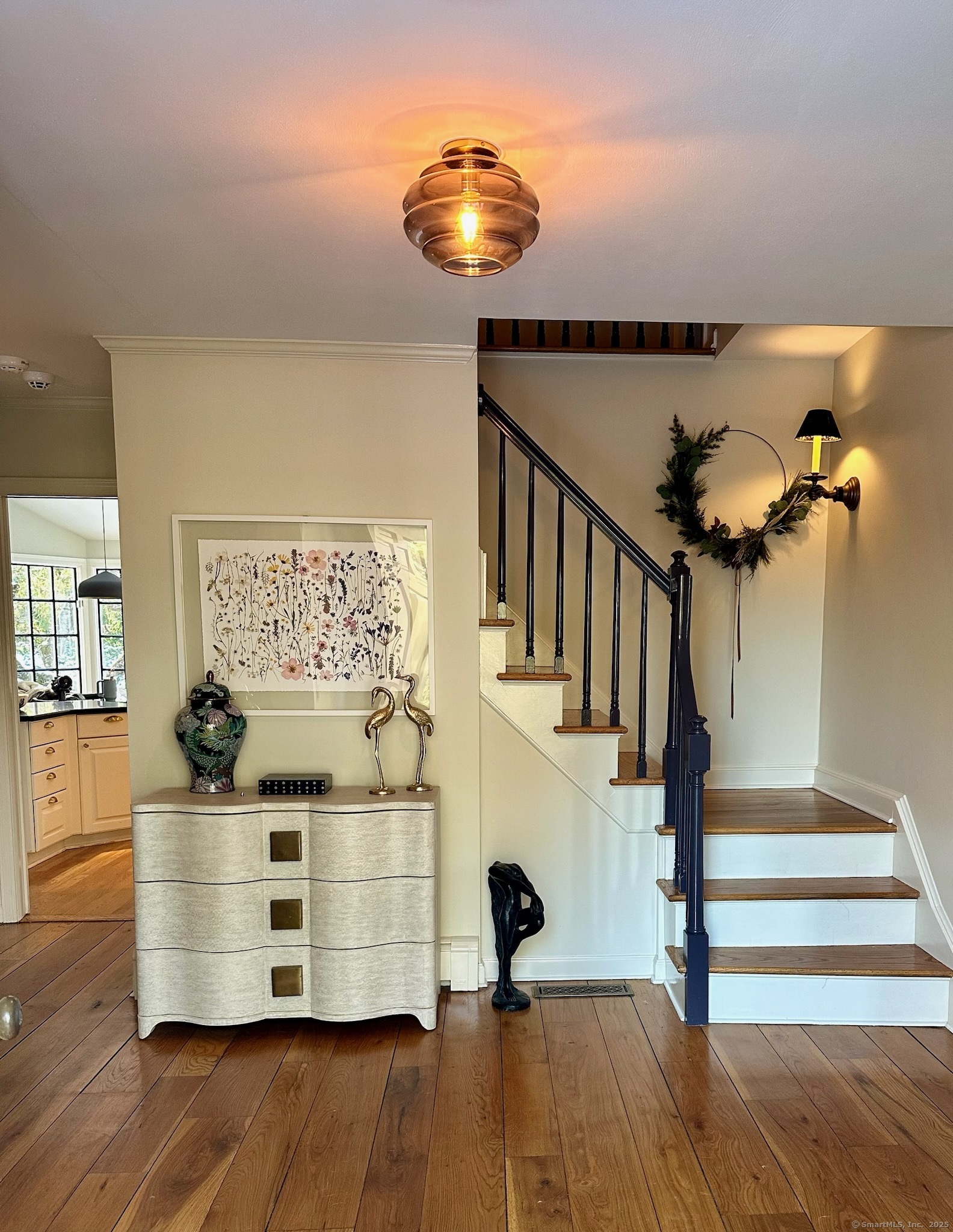 25 Deacons Lane Wilton, CT 06897 - Photo 6 of 37 a view of entryway and hall with wooden floor