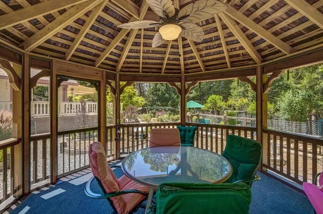 an aerial view of house with yard