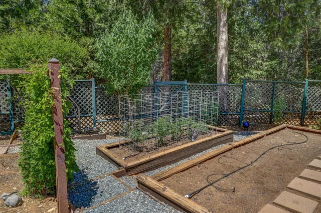 a bathroom with a toilet sink vanity and mirror