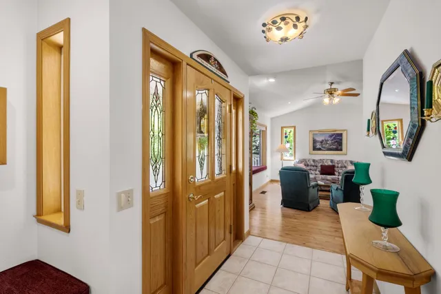 a view of a street with large trees