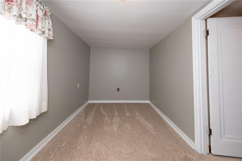 1539 Dime Road Vandergrift, PA 15690 - Photo 17 of 27 a view of an empty room with wooden floor