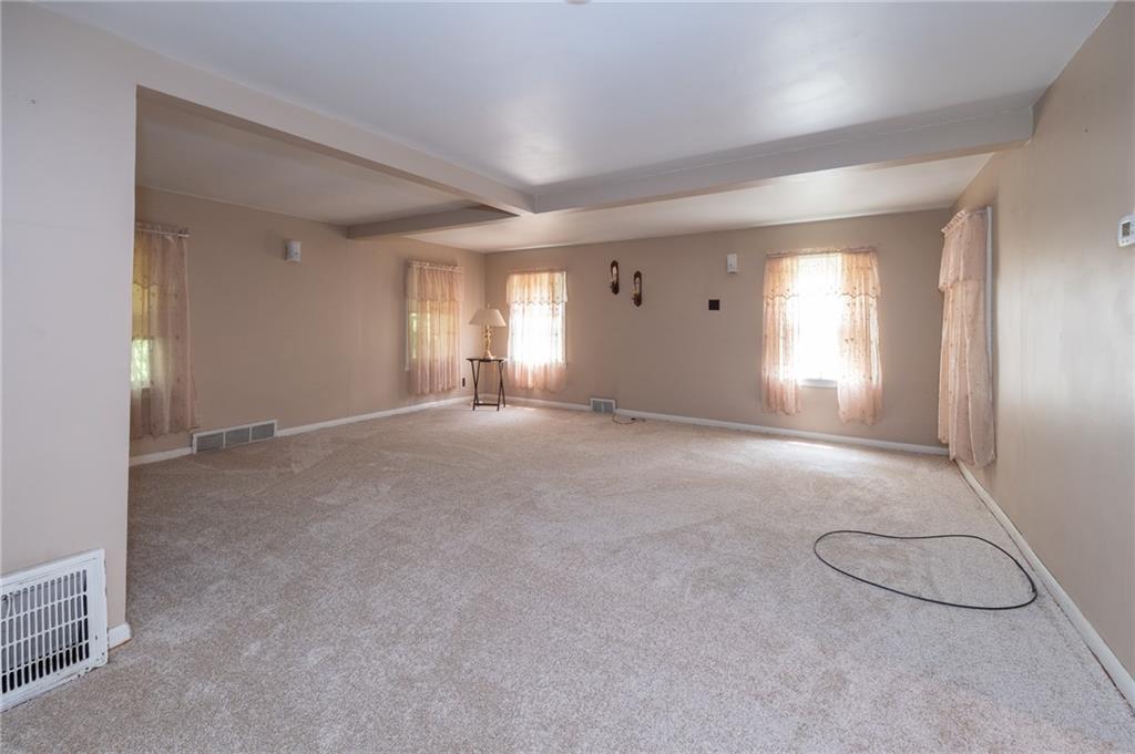 1539 Dime Road Vandergrift, PA 15690 - Photo 8 of 27 a view of a room with large windows