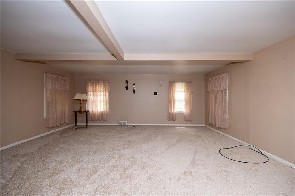 1539 Dime Road Vandergrift, PA 15690 - Photo 9 of 27 an empty room with windows and closet