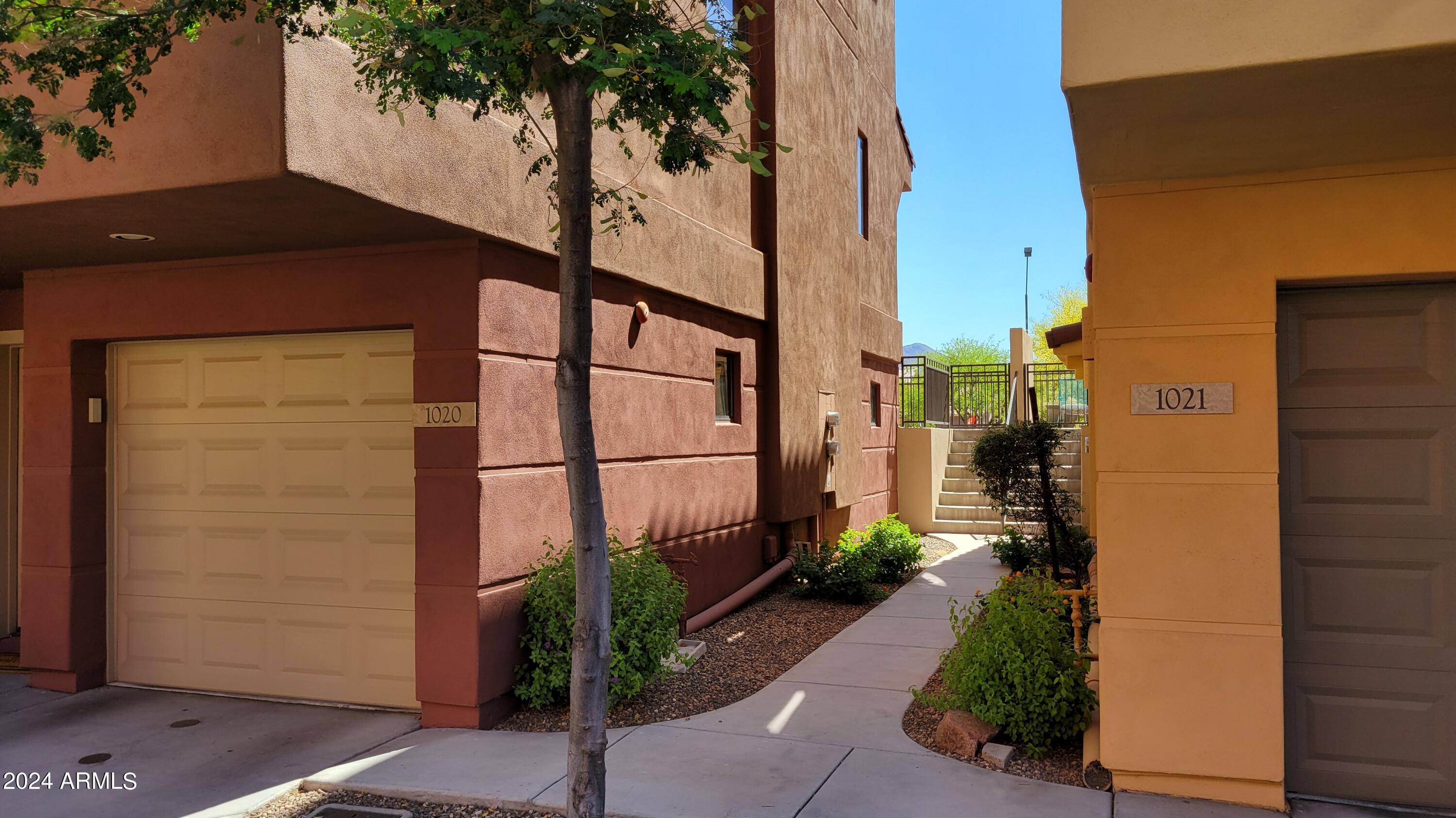 9551 East Redfield Road, Unit 1020 Scottsdale, AZ 85260 - Photo 7 of 38 Walkway to Front Patio