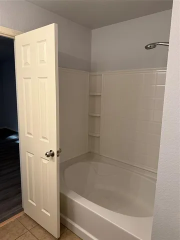 a bathroom with a bathtub
