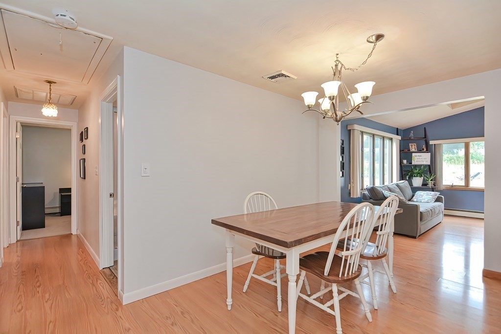 2 Temi Road Framingham, MA 01701 - Photo 12 of 34 a view of a dining room with furniture and wooden floor