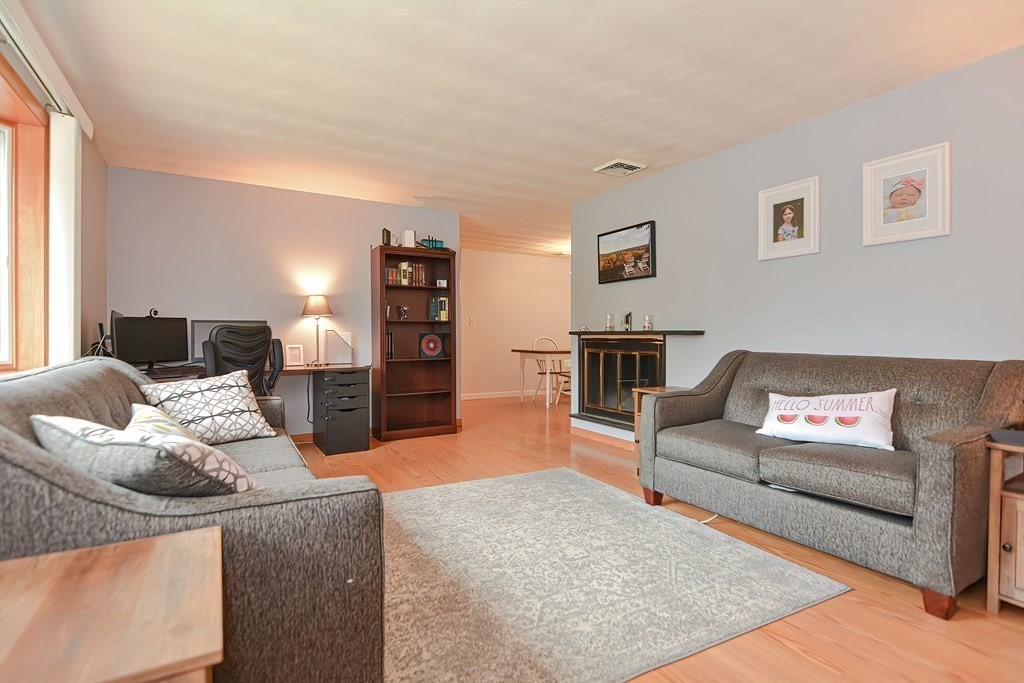 2 Temi Road Framingham, MA 01701 - Photo 13 of 34 a living room with furniture and a couch