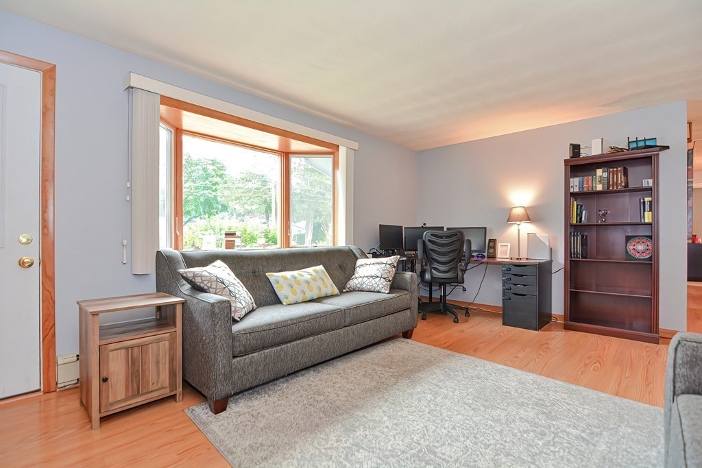 2 Temi Road Framingham, MA 01701 - Photo 14 of 34 a living room with furniture and a flat screen tv