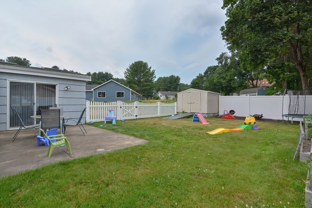 2 Temi Road Framingham, MA 01701 - Photo 33 of 34 a view of backyard with a table and chairs