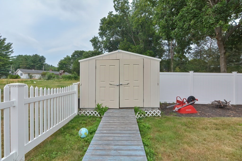 2 Temi Road Framingham, MA 01701 - Photo 34 of 34 a view of a small yard and a fence