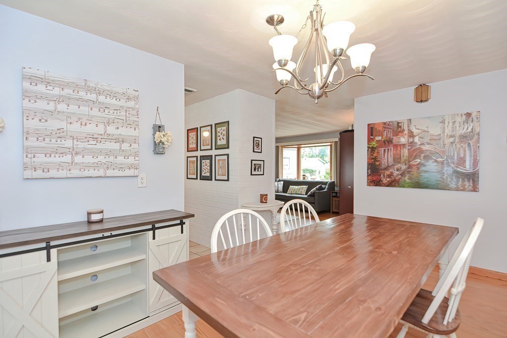 2 Temi Road Framingham, MA 01701 - Photo 10 of 34 a view of a dining room with furniture and chandelier