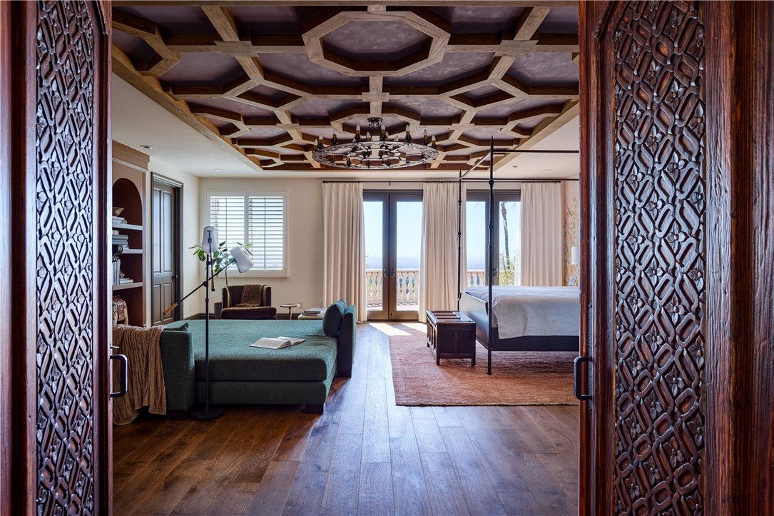 2019 Polo Court Riverside, CA 92506 - Photo 12 of 26 Hand carved doors important from Mexico welcome you to the luxurious primary suite.