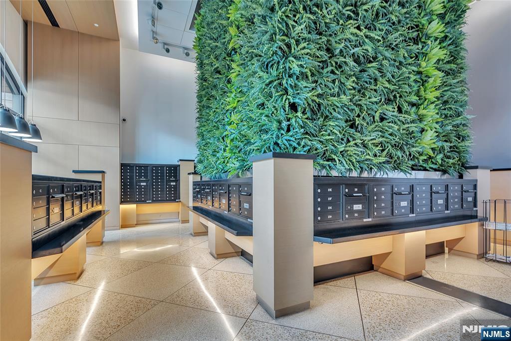 250 Gorge Road, Unit 21E Cliffside Park, NJ 07010 - Photo 18 of 21 a balcony with chairs and a couch