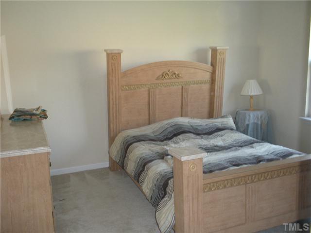 5813 Weddington Road Raleigh, NC 27610 - Photo 8 of 14 Bedroom 2 is 12.6x12.8 ... large secondary bedrooms are hard to find ...