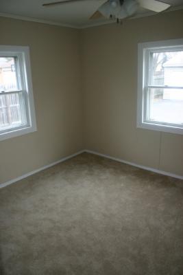 6713 Clarendon Hills Road Darien, IL 60561 - Photo 9 of 11 an empty room with a window
