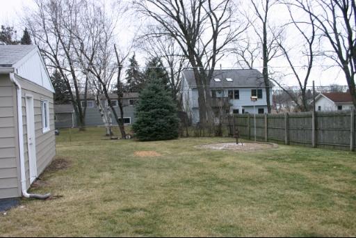 6713 Clarendon Hills Road Darien, IL 60561 - Photo 10 of 11 a view of a yard with a trees