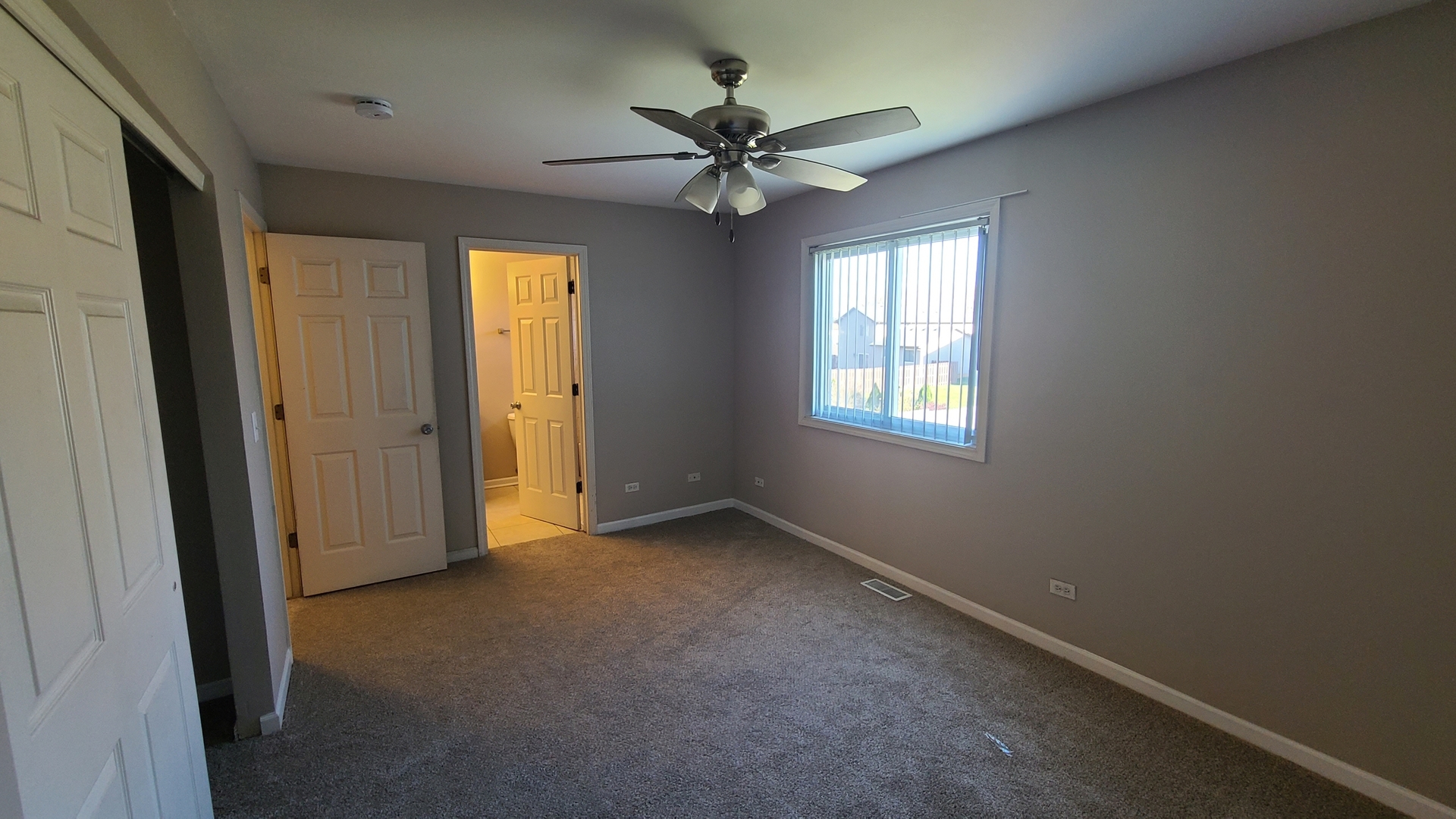 125 Deerpath Road Matteson, IL 60443 - Photo 15 of 19 a view of an empty room with a window