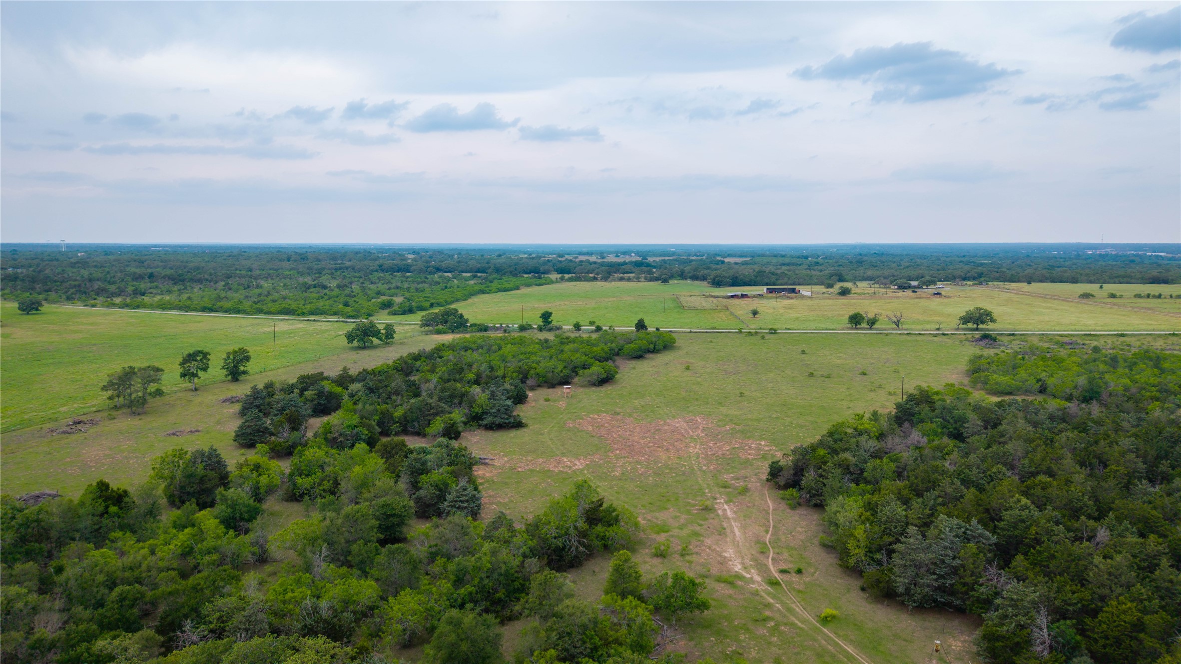 Tbd(2 Walter Hoffman Road Cedar Creek, TX 78612 - Photo 11 of 28 a view of a lake with houses in all around