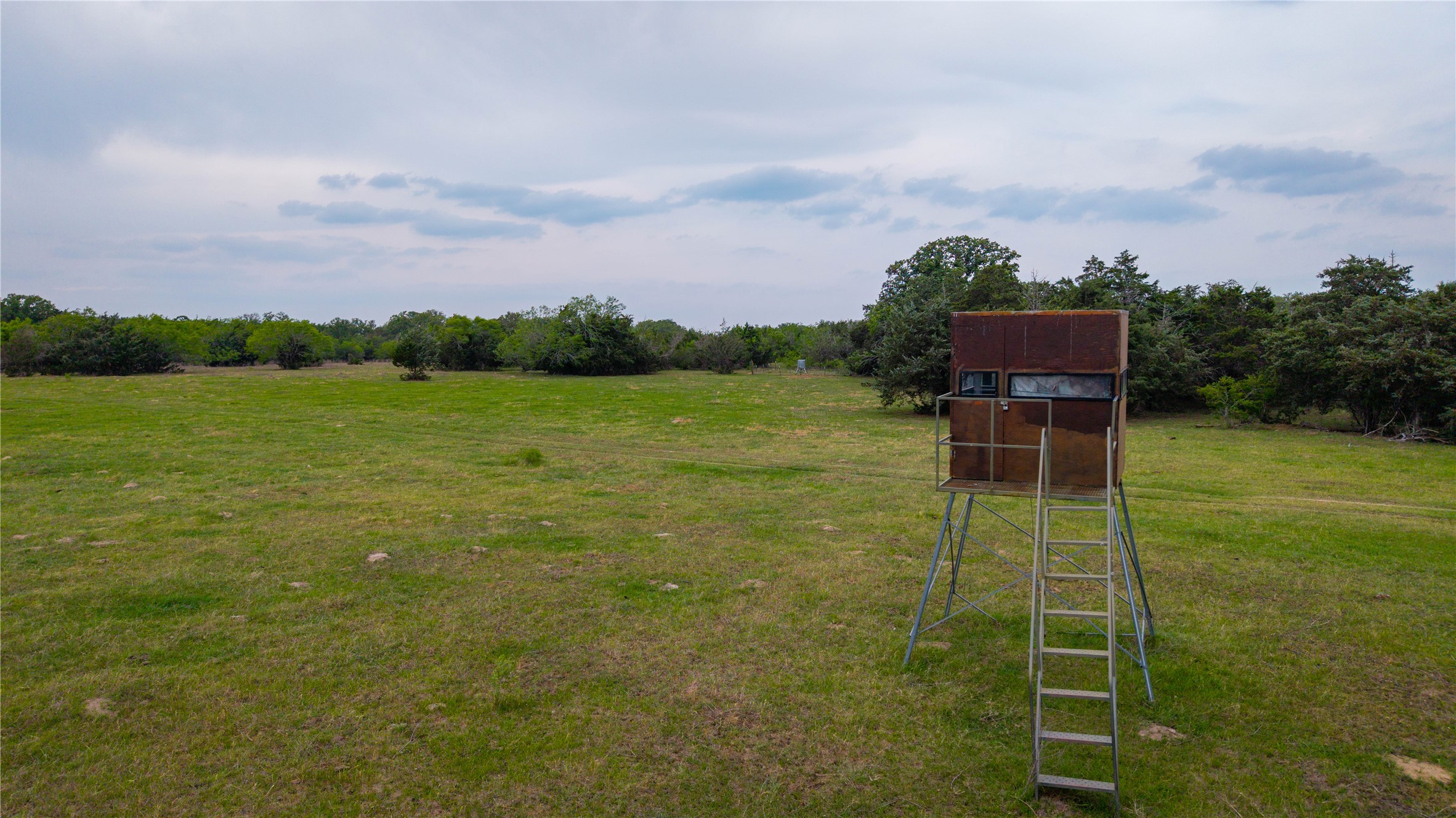 Tbd(2 Walter Hoffman Road Cedar Creek, TX 78612 - Photo 22 of 28 a backyard of a house with table and chairs