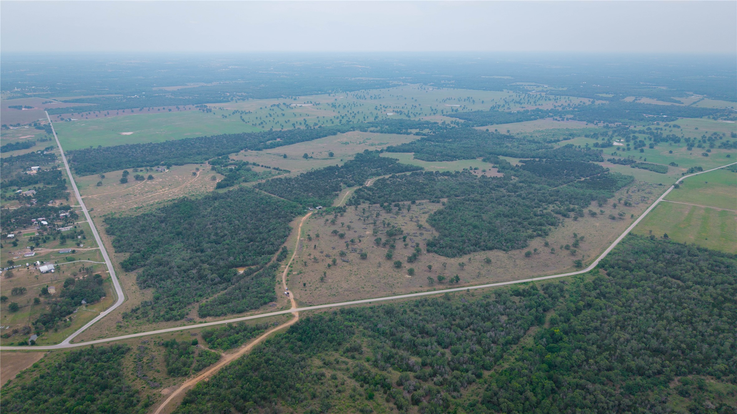 Tbd(2 Walter Hoffman Road Cedar Creek, TX 78612 - Photo 3 of 28 an aerial view of a house with a yard