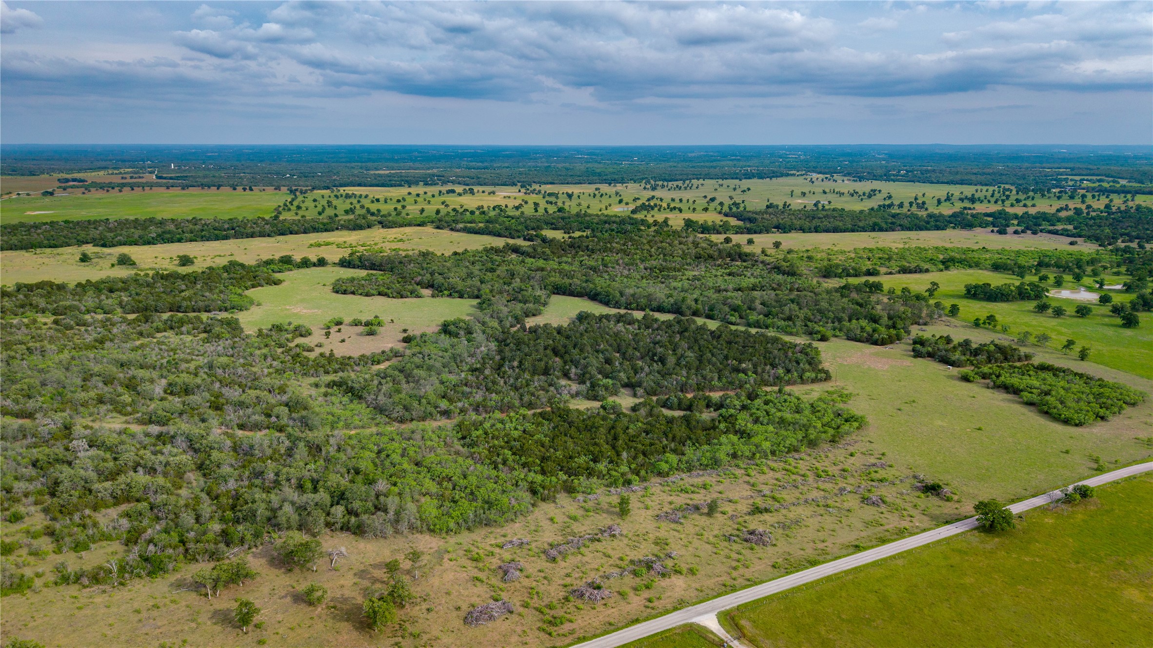 Tbd(2 Walter Hoffman Road Cedar Creek, TX 78612 - Photo 7 of 28 a view of a field with an ocean