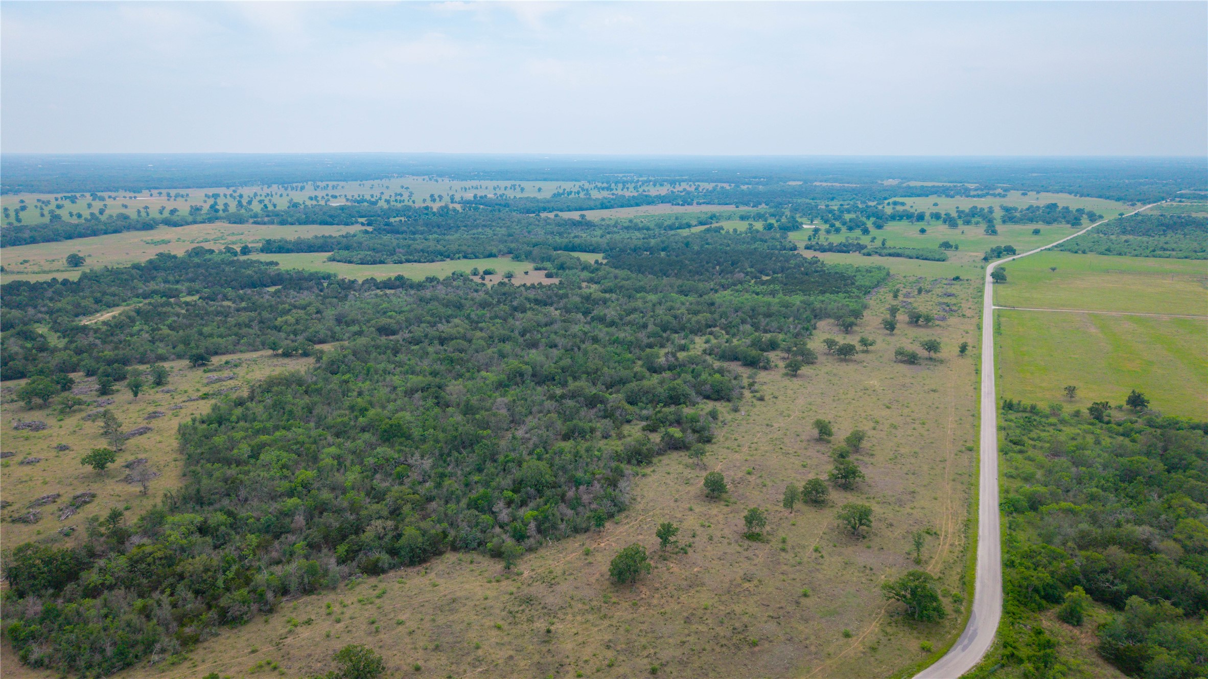 Tbd(2 Walter Hoffman Road Cedar Creek, TX 78612 - Photo 8 of 28 an aerial view of a houses with beach