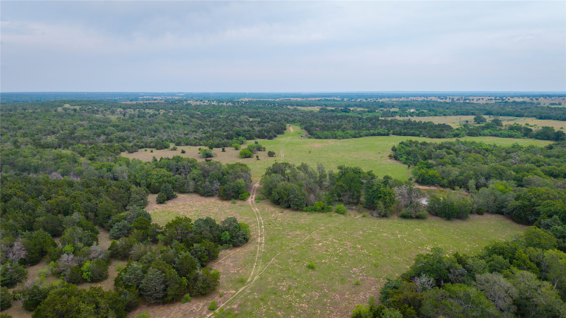 Tbd(2 Walter Hoffman Road Cedar Creek, TX 78612 - Photo 10 of 28 an aerial view of residential houses with outdoor space and trees