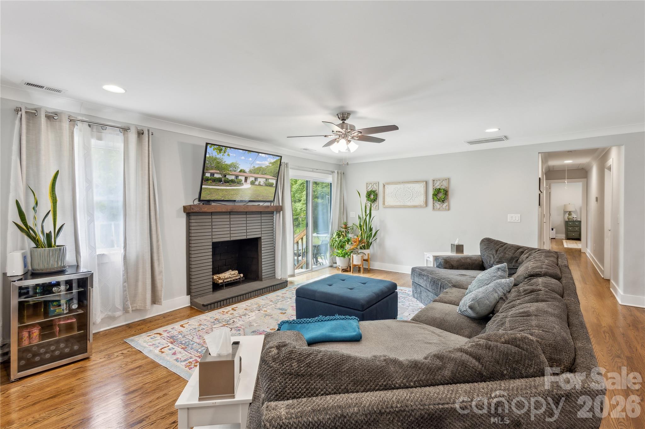 7200 Monroe Road Charlotte, NC 28212 - Photo 11 of 37 a living room with furniture and a fireplace