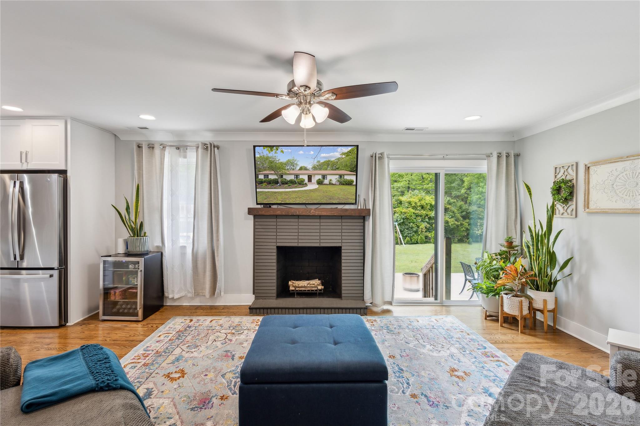 7200 Monroe Road Charlotte, NC 28212 - Photo 12 of 37 a living room with furniture and a fireplace