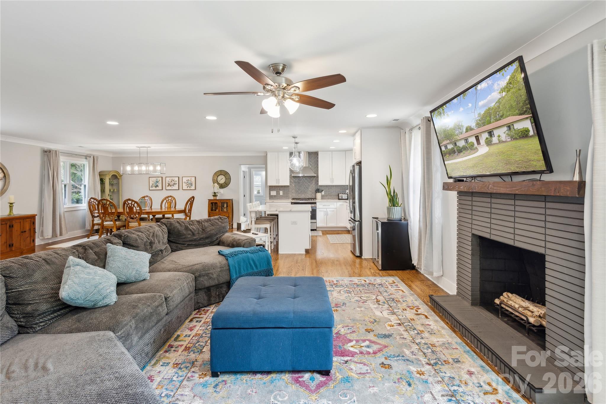 7200 Monroe Road Charlotte, NC 28212 - Photo 13 of 37 a living room with furniture and a fireplace