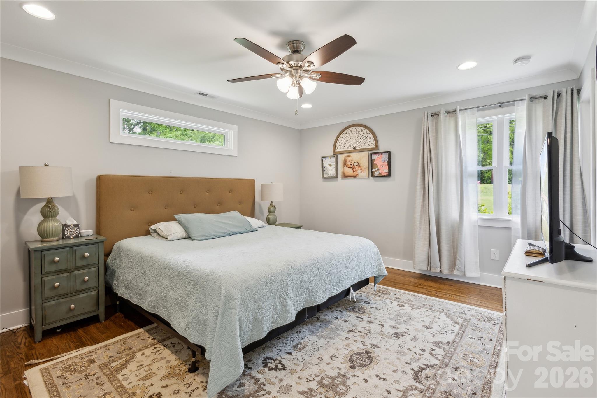 7200 Monroe Road Charlotte, NC 28212 - Photo 14 of 37 a bedroom with a large bed and a window